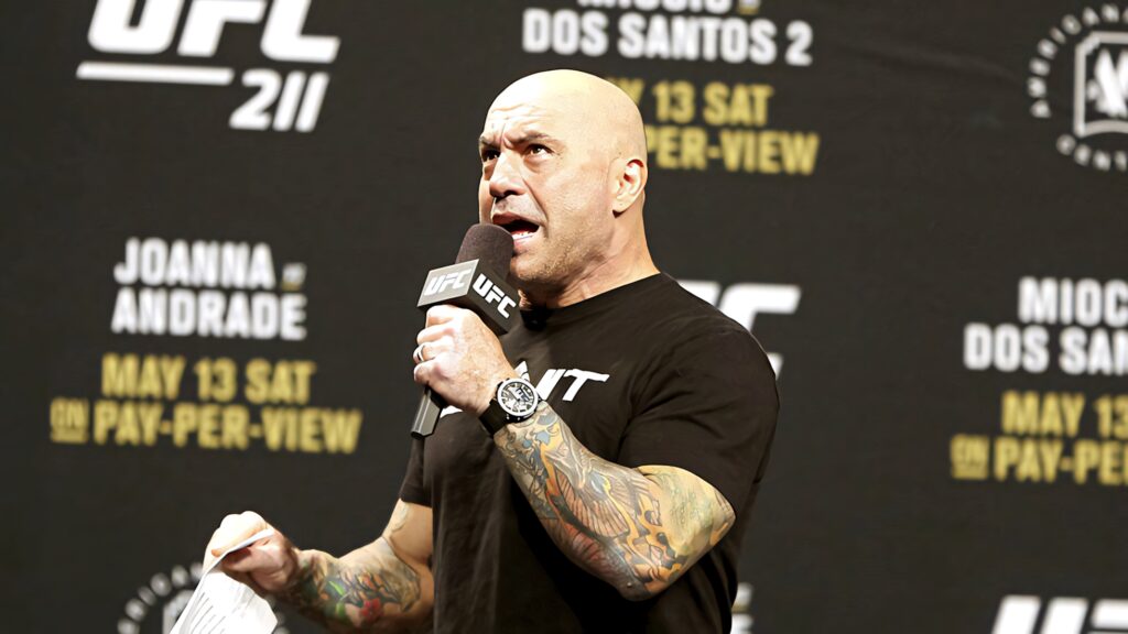 Joe Rogan passionately commentates a high-energy UFC event capturing fight excitement wallpaper