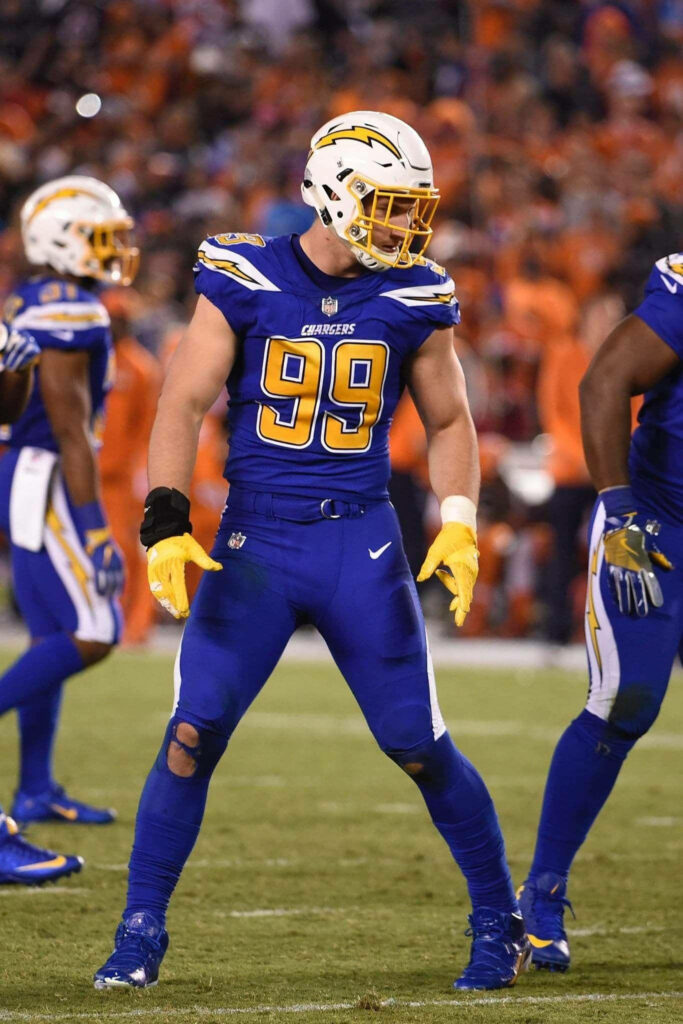 Intense Joey Bosa in Chargers Uniform | Football Wallpaper Background