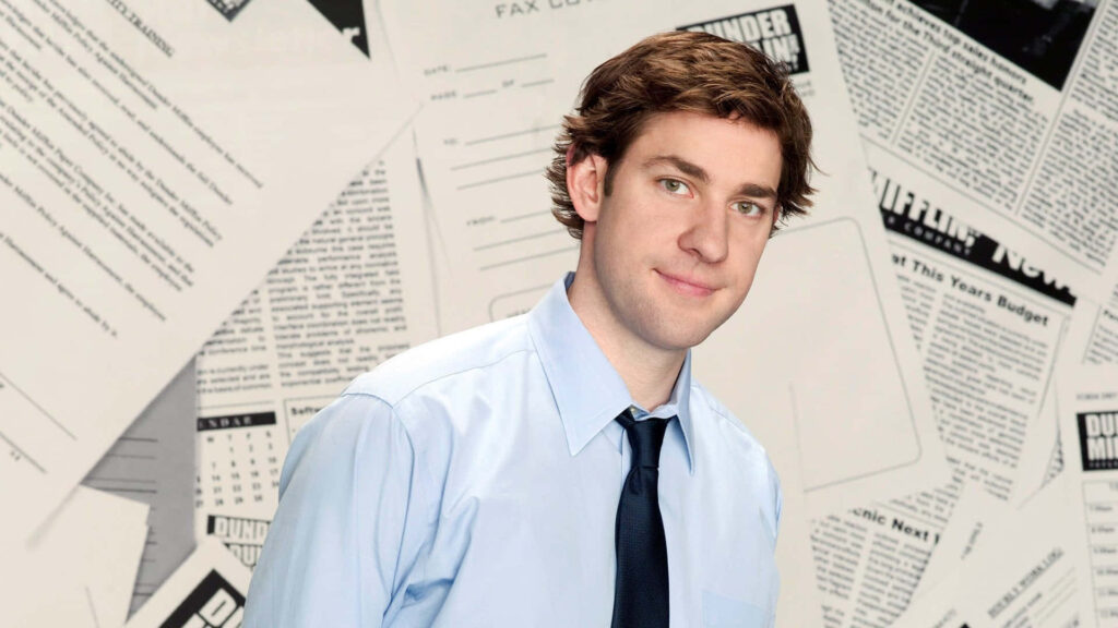 John Krasinski as Jack Ryan in professional setting with documents background wallpaper