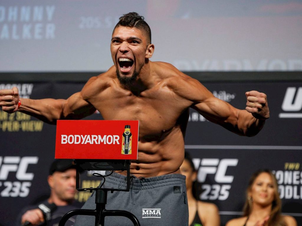 Johnny Walker UFC 235 weigh-in flexing muscular MMA fighter shouting intense energy wallpaper