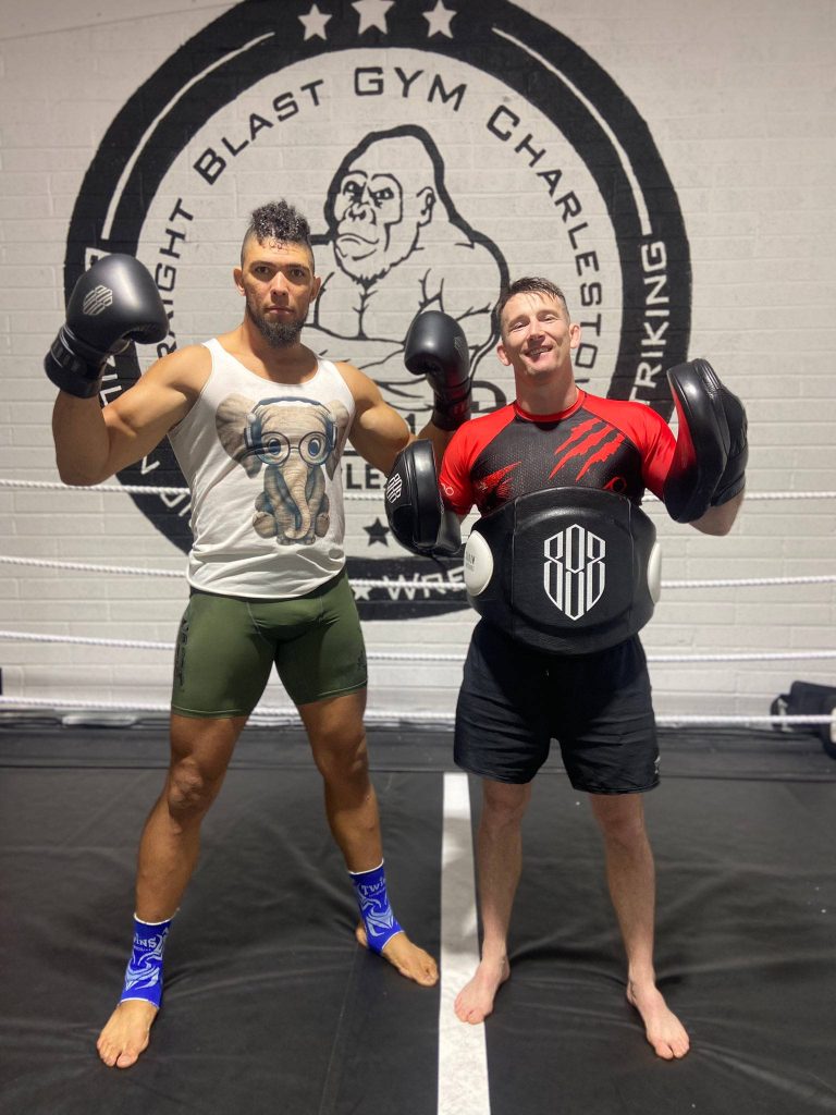 UFC fighter Johnny Walker training with coach at Straight Blast Gym Charleston in elephant print tank top Wallpaper