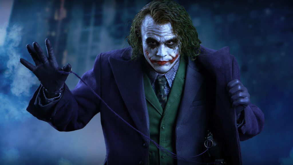 Rising from the Ashes: Black Ultra HD Joker Raises Hand Against Crumbling Cityscape - Wallpaper