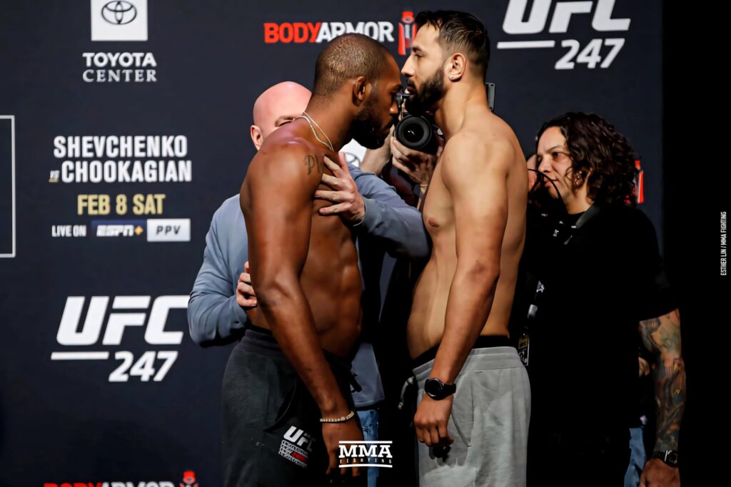 Jon Jones and Dominick Reyes UFC 247 weigh-in intense face-off dramatic lighting sharp focus wallpaper