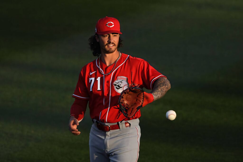 Jonathan India Cincinnati Reds number 71 in red uniform on green turf dynamic sports wallpaper