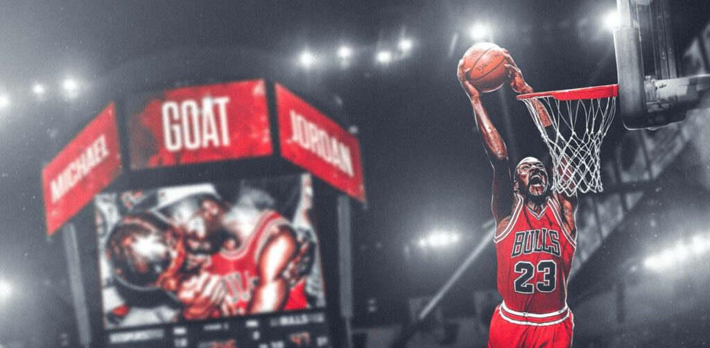 Airborne Brilliance: Michael Jordan's Majestic Slam Dunk Surrounded by GOAT Enthusiasm Wallpaper