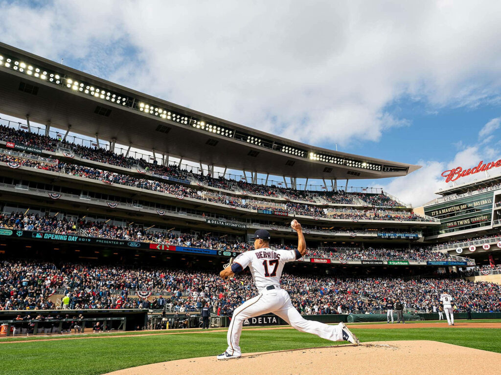 Jose Berrios Game Day Wallpaper: Pitching in a Packed Stadium