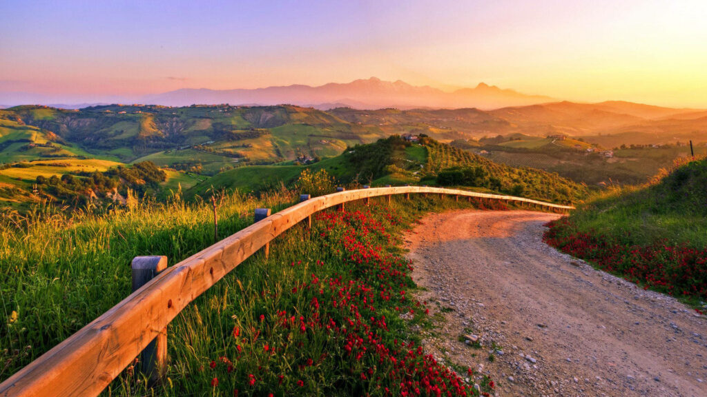 Escape to Serenity: A Country Adventure through Majestic Mountains - Wallpaper background photo.