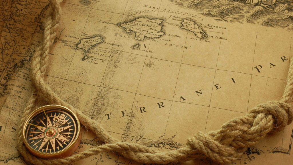 Embracing Nostalgia: Wayfinding Tools Transported in Vintage Laptop Background Wallpaper