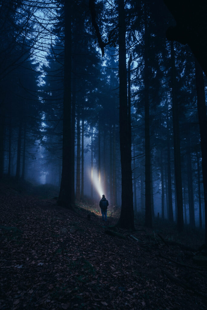 Journey into the Mysterious Abyss: Guided by a Solitary Beam Wallpaper