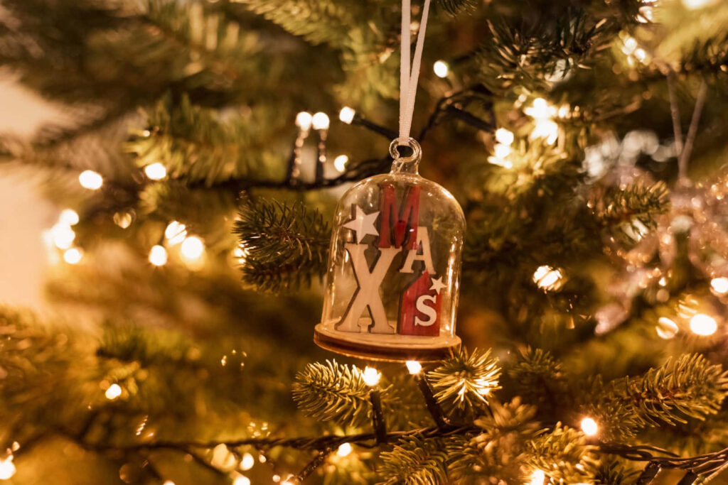 Joyful Christmas Wallpaper: Twinkling Tree & XMAS Ornament Background