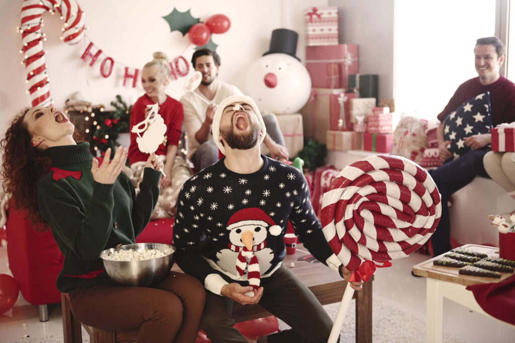 Joyful Christmas Party Wallpaper: Festive Holiday Scene & Decor