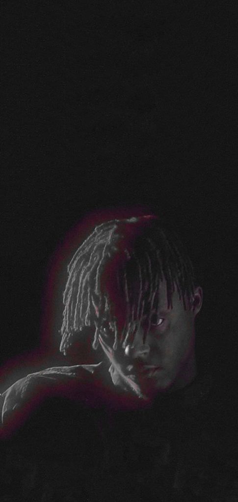 Moody minimalist Juice WRLD portrait wallpaper with red rim light on black background phone screen