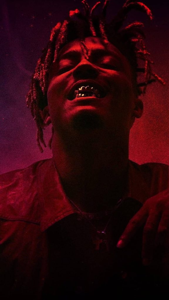Juice WRLD neon red close-up wallpaper with dreadlocks grills moody rapper smartphone background