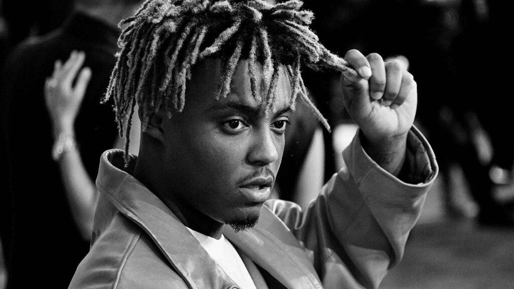 Stylishly Cool: Juice Wrld in Action - Adding Flair to Your Desktop with Juice Wrld's Hair Wallpaper
