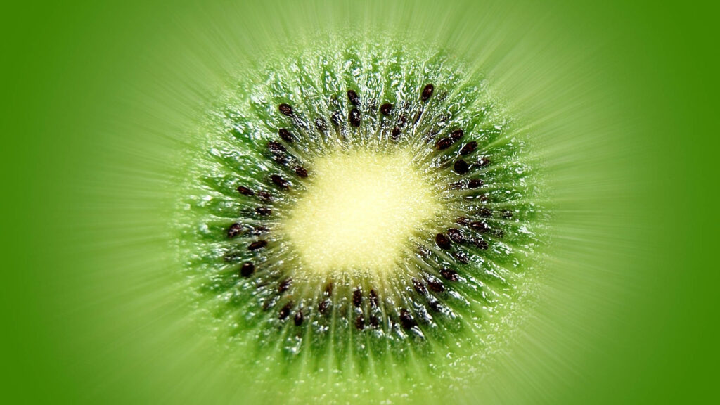 Vibrant Kiwi Fruit Core Wallpaper: Juicy Green Texture & Freshness