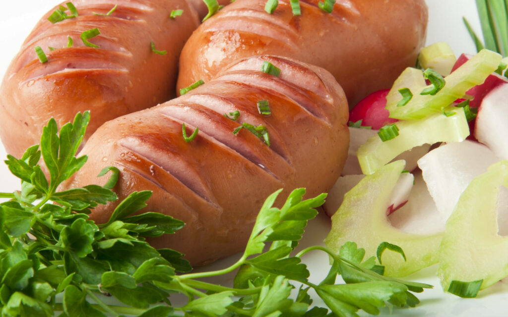 Juicy Mini Pork Sausages with Chives & Fresh Veggies - Wallpaper Background