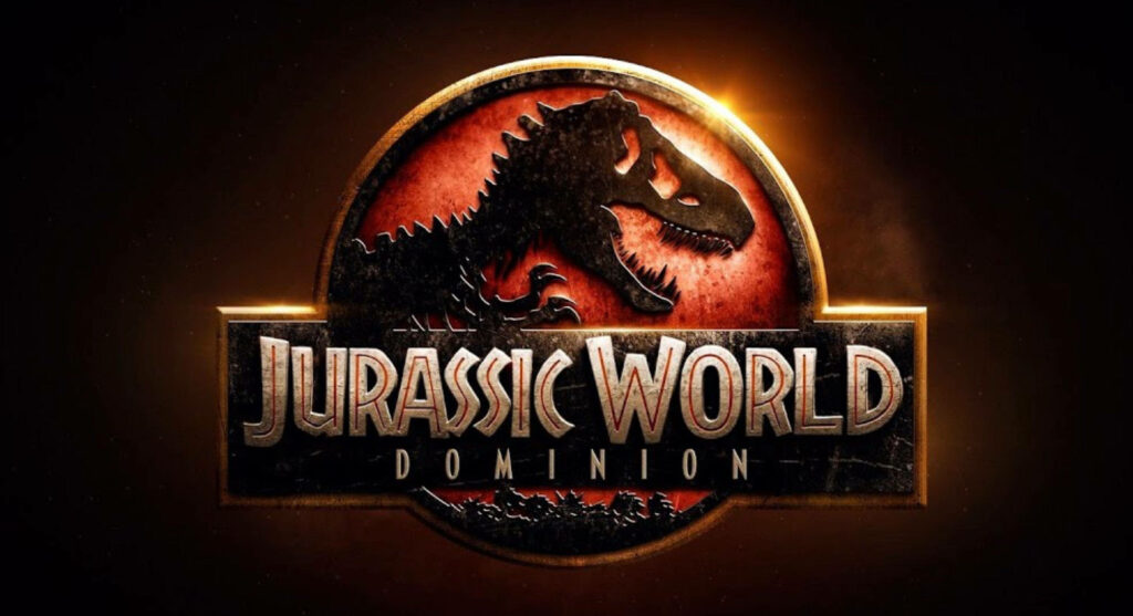 Jurassic World Dominion dark poster with illuminated dinosaur logo on shadowy background wallpaper