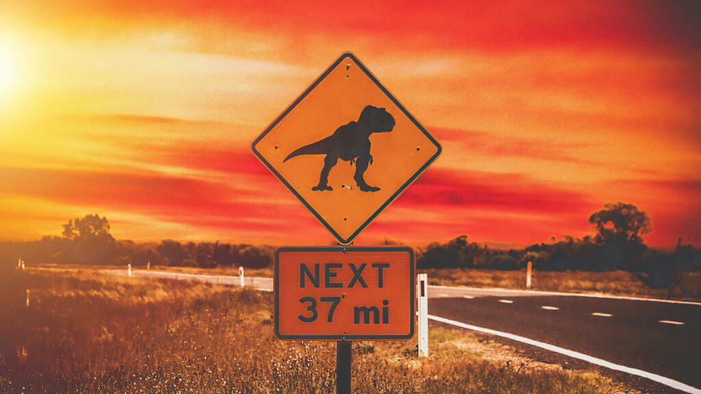 Jurassic World-Inspired T-Rex Sign Wallpaper at Sunset