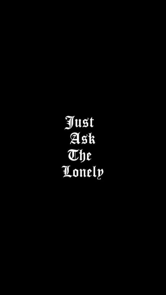 Emo wallpaper black background with Just Ask The Lonely bold white gothic text minimalist design