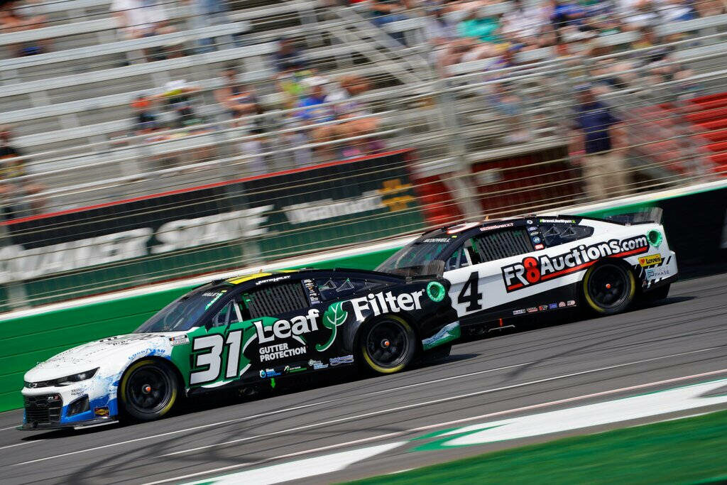 Justin Haley racing No 31 Leaf Filter car speeding on track thrilling motorsport fans wallpaper