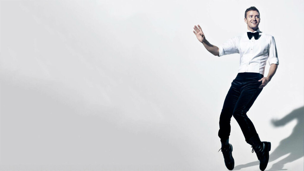 Justin Timberlake on Tip-Toe: Elegant Formal Wallpaper Background