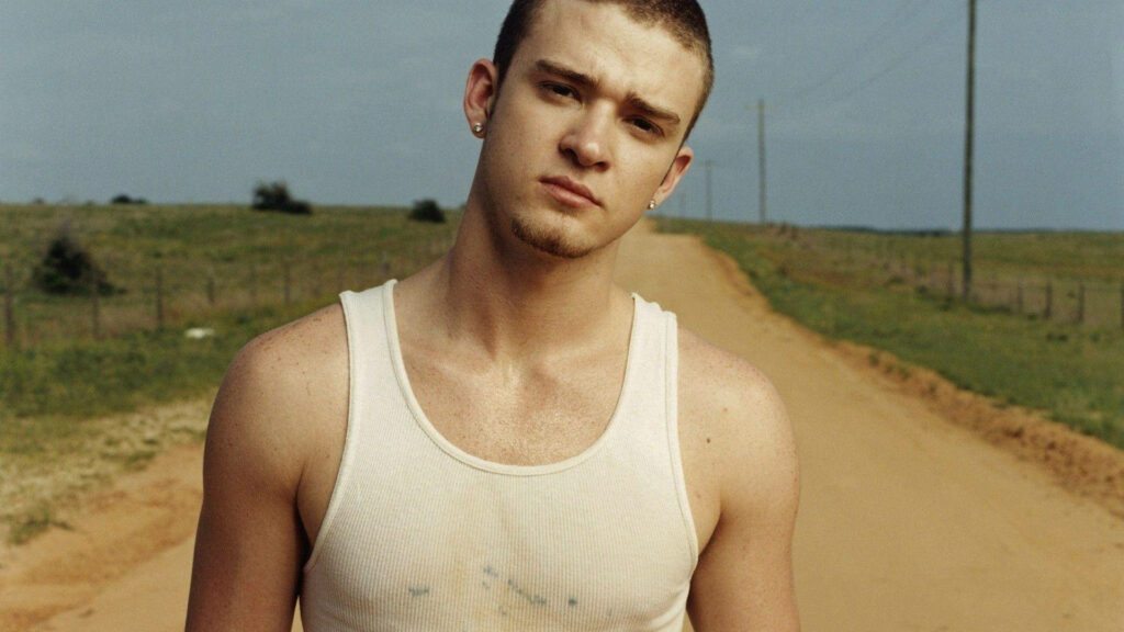 Justin Timberlake Outdoor Wallpaper: Casual Style in Rural Setting