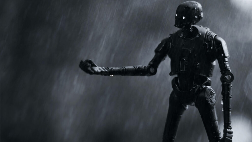 Monochromatic K-2SO Wallpaper: Sleek Droid in Rainy Setting
