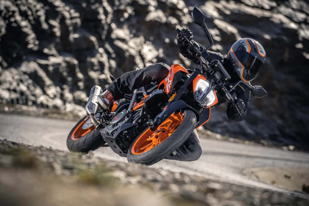 Agile KTM Duke 390: Adrenaline Ride on Rugged Mountain Wallpaper