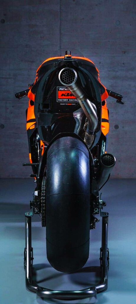 KTM Motorcycle Wallpaper: Bold Design & Aggressive Exhaust Background