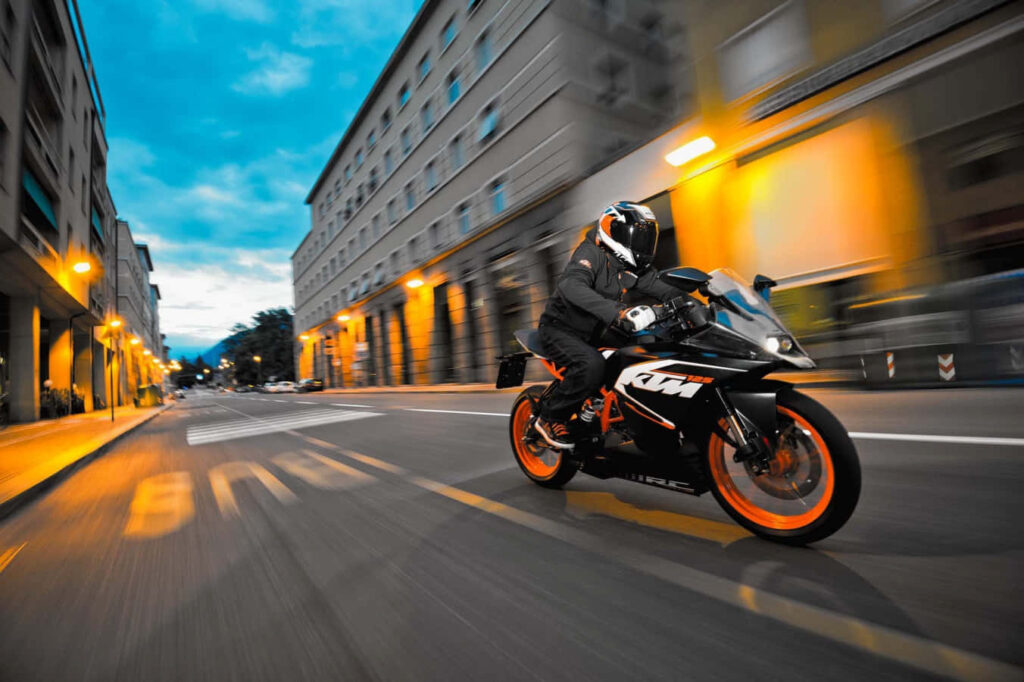 KTM RC 125 Motorcycle Wallpaper: Sleek Design & Urban Vibes
