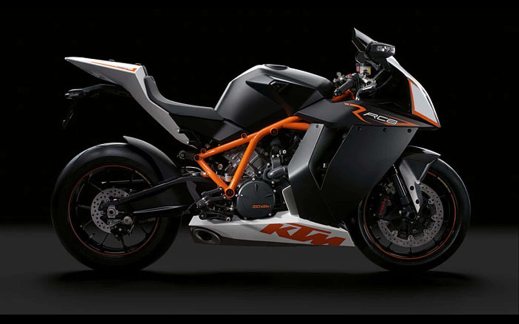 Sleek KTM RC8 Motorcycle Wallpaper - Black & Orange Design