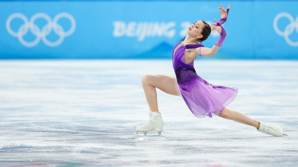 Kamila Valieva Russian figure skating 2022 Olympics mid-routine graceful powerful performance Wallpaper