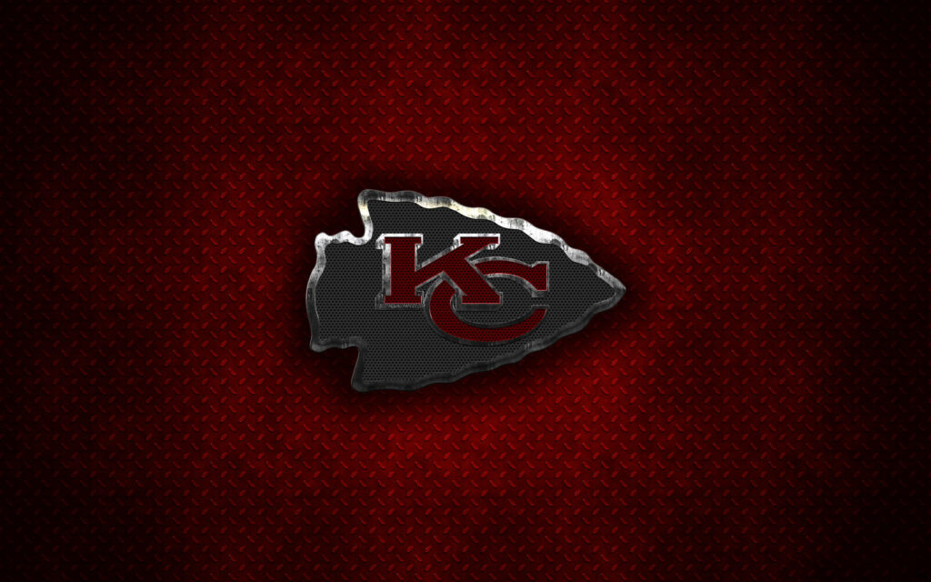 Kansas City Chiefs logo on textured dark red background bold modern wallpaper for fans