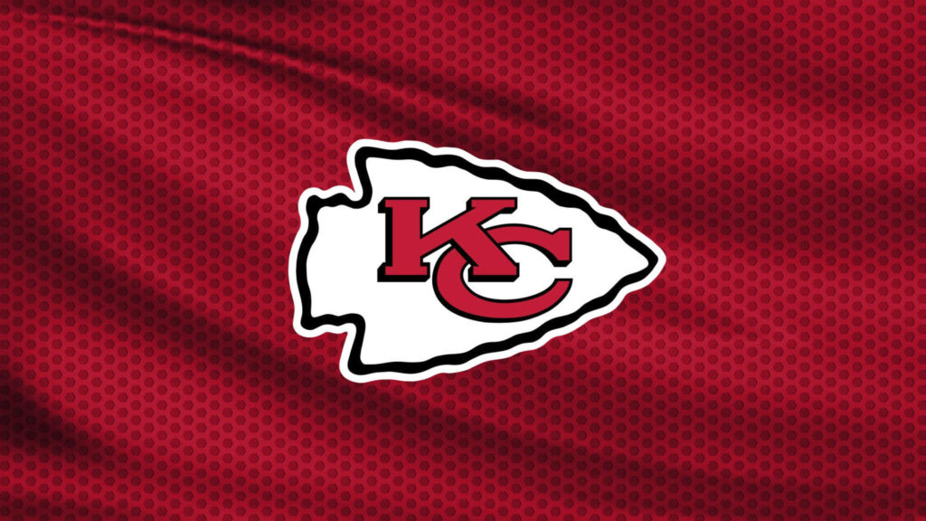 Kansas City Chiefs logo on textured red flag background NFL team wallpaper background