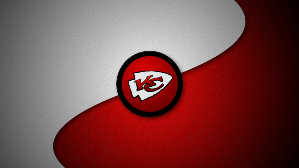 Kansas City Chiefs logo on bold red and white textured background vibrant team wallpaper