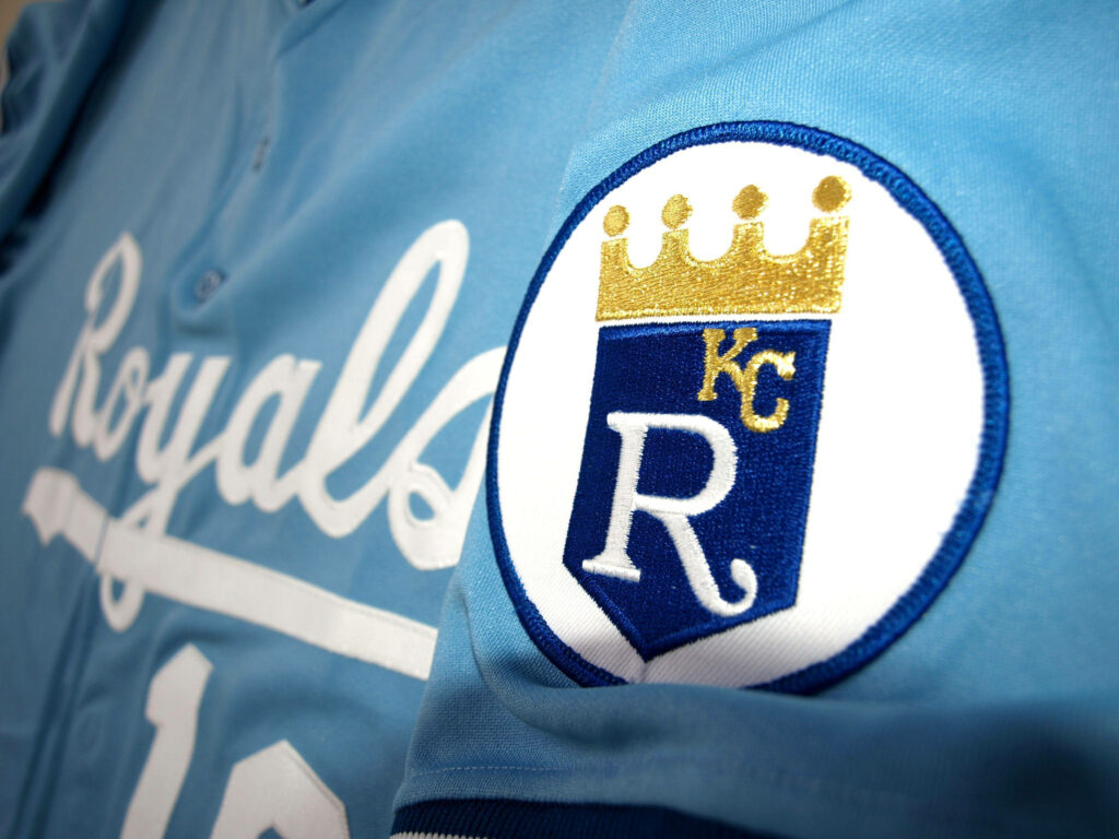 Kansas City Royals logo patch on powder blue classic uniform with crown emblem and Royals script Wallpaper