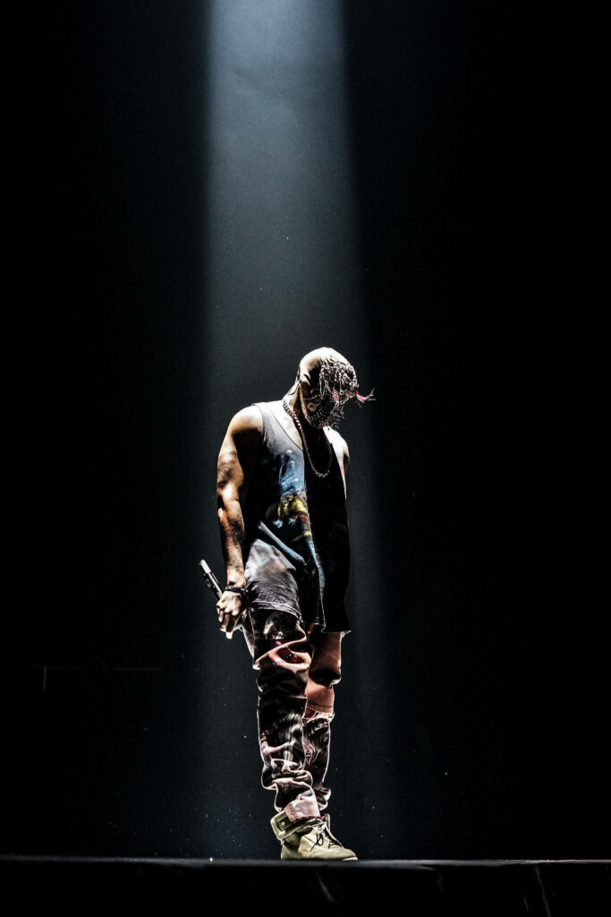 Kanye West Wallpaper: Dramatic Spotlight Creates Intense Atmosphere