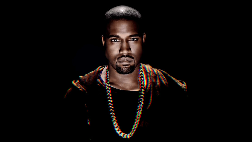Kanye West Wallpaper: Bold Style with Gold Chain on Dark Background