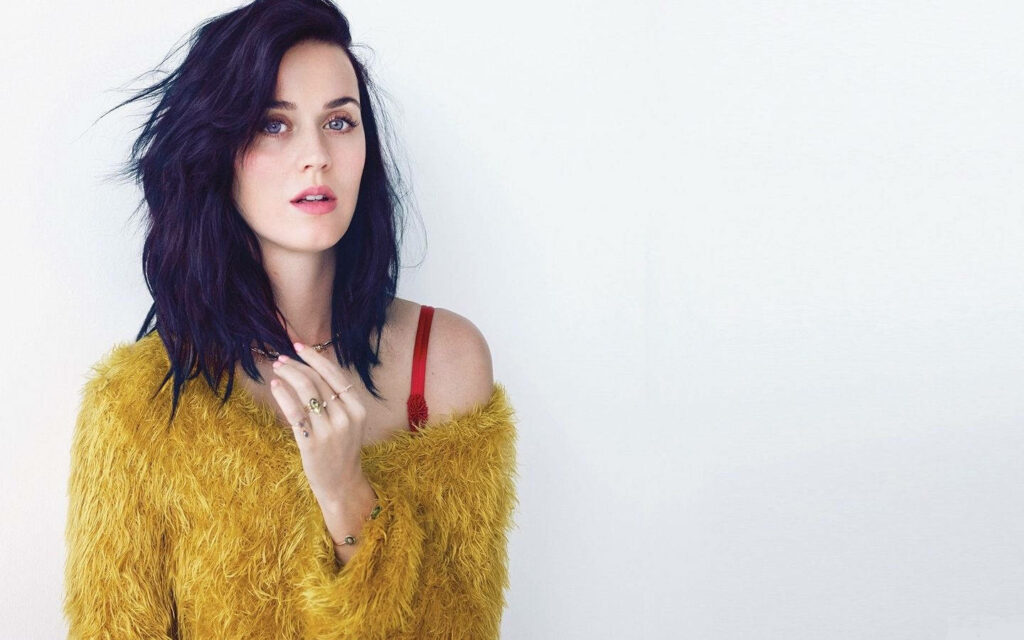 Katy Perry: Stylish & Elegant in Yellow Fur Shirt - Chic Wallpaper