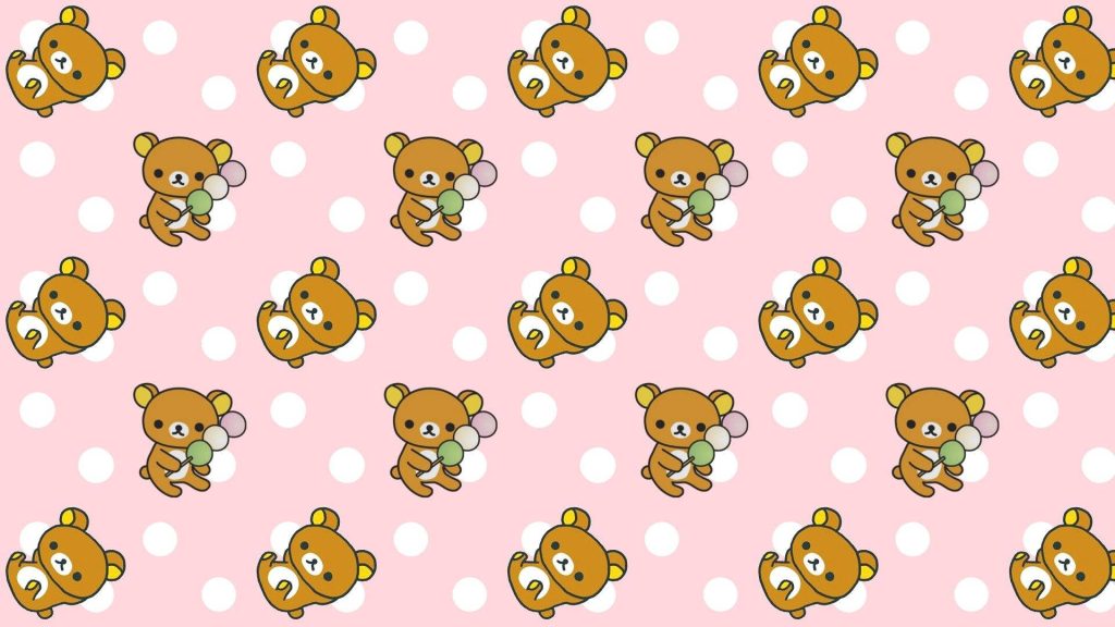 Kawaii Rilakkuma wallpaper with playful bears holding colorful dango on pink polka dot background