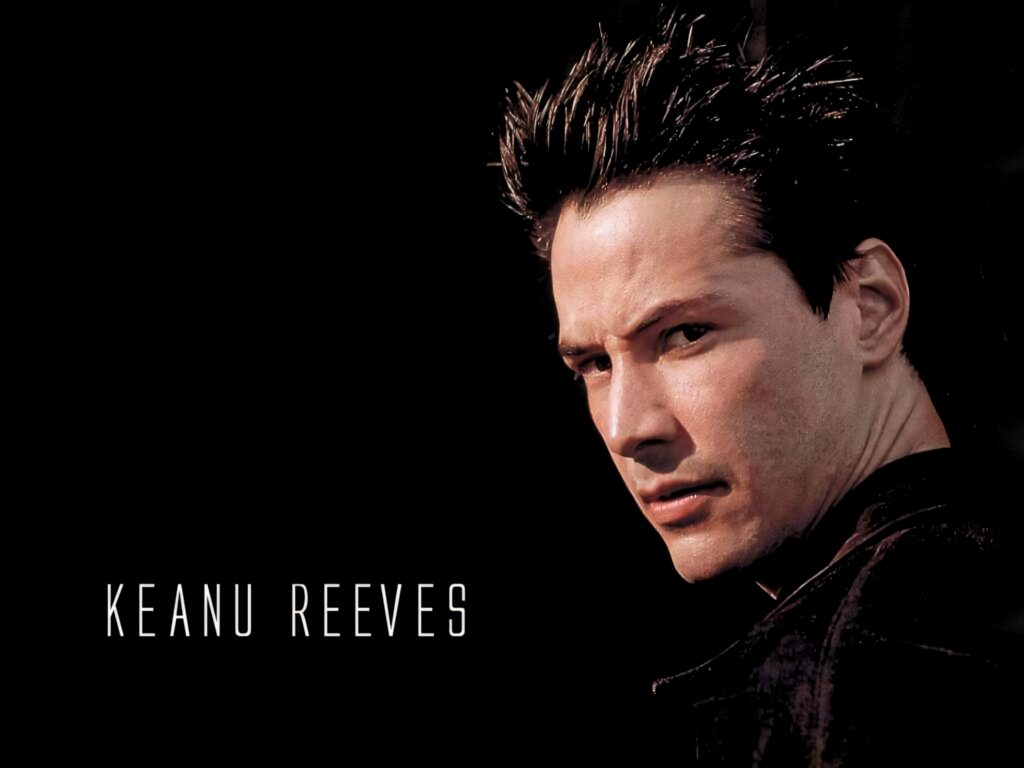 Intense Keanu Reeves Close-Up: Striking Charismatic Wallpaper
