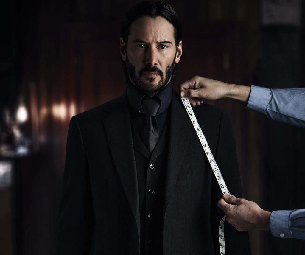 Keanu Reeves Wallpaper: Confident & Focused in Sleek Black Suit
