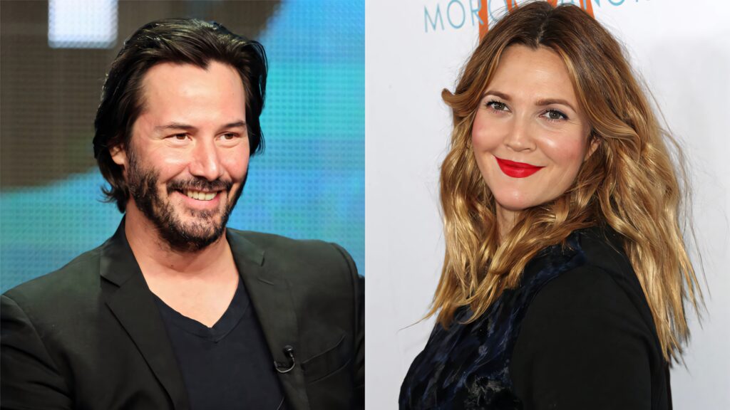 Keanu Reeves in black suit and Drew Barrymore smiling with red lipstick on neutral background wallpaper