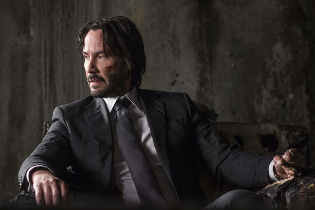 Intense John Wick Wallpaper: Keanu Reeves in Formal Suit