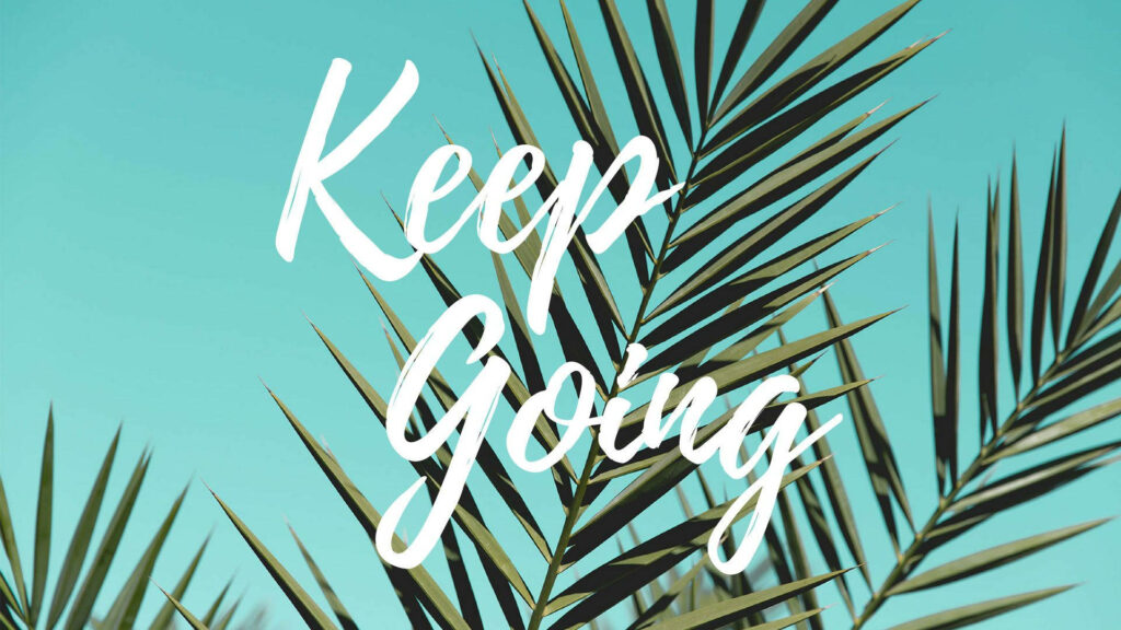Keep Going: Uplifting Wallpaper with Bold Script & Palm Leaves