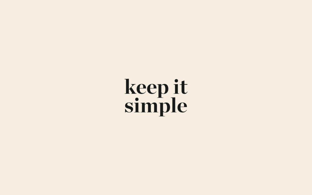 Minimalist 4K wallpaper with keep it simple serif font on warm beige background for calm vibes