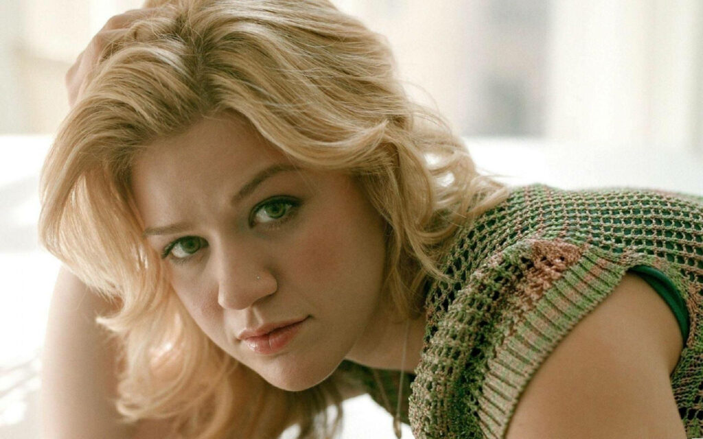 Kelly Clarkson graceful portrait in soft natural light elegant confident wallpaper background
