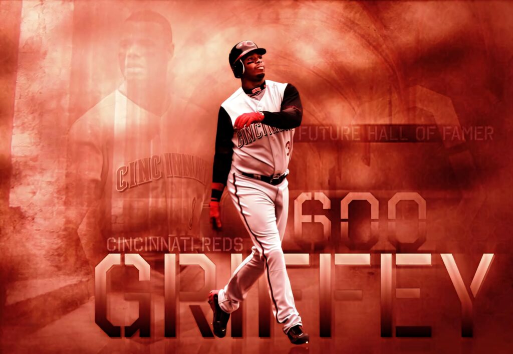 Ken Griffey Cincinnati Reds mid-swing wallpaper with red background and MLB milestone highlights