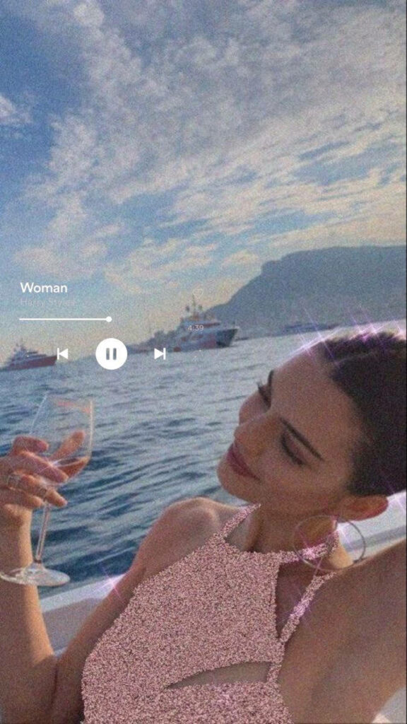 Kendall Jenner's Serene Boat Moment: Ocean View Wallpaper Background
