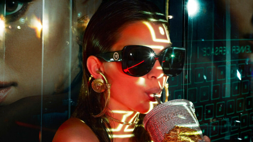 Kendall Jenner in Versace Sunglasses: Glamorous Wallpaper Background
